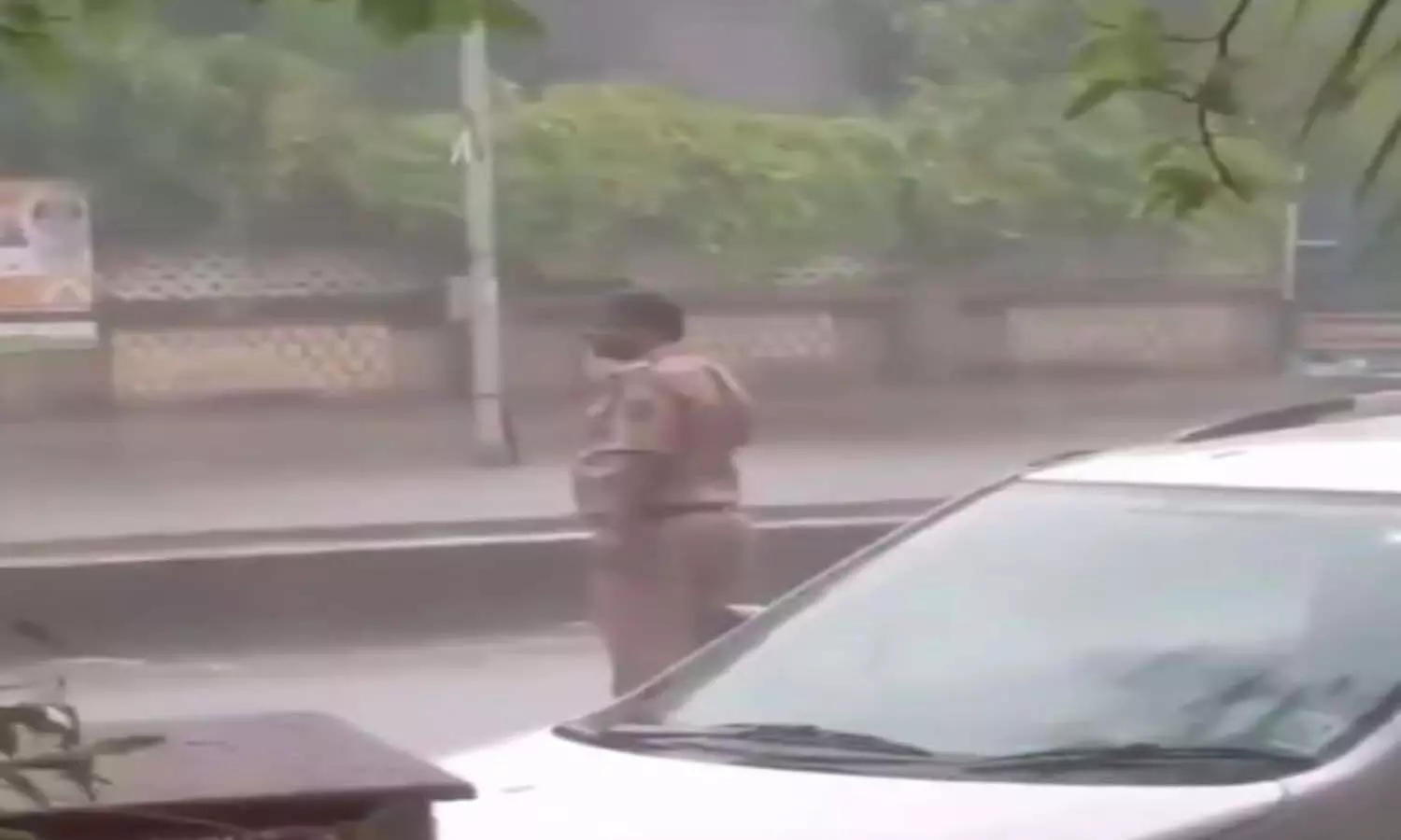 Cyclone Tauktae: A cop wins the internet, performs duty amid heavy rain & gusty winds; WATCH