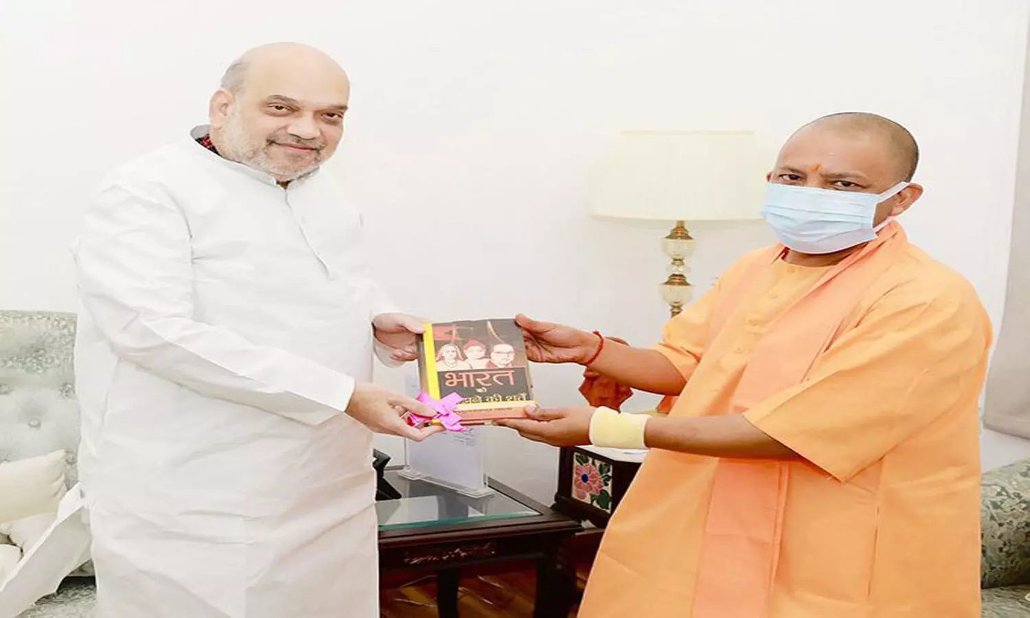 UP CM Adityanath pays courtesy call to Union Home Minister Amit Shah in Delhi