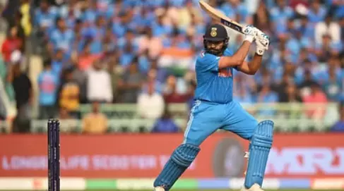 Rohit steadies India as England bowlers check flow of runs