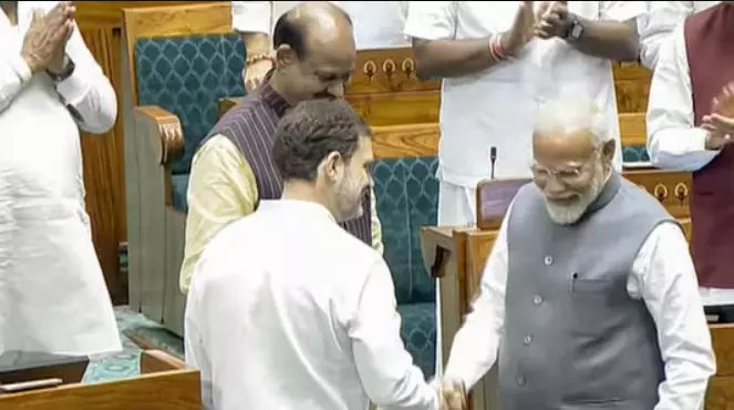 Modi, Rahul shake hands in Lok Sabha