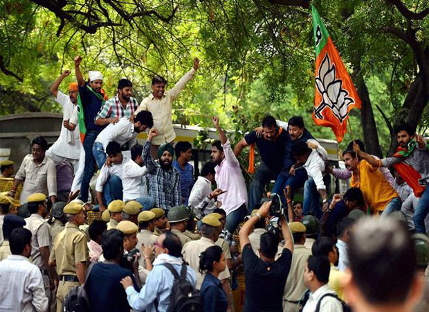 BJP workers hold a demonstration in-front of Sonias residence