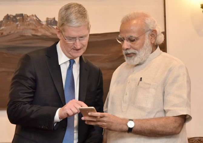 Cook launches the Narendra Modi mobile app...