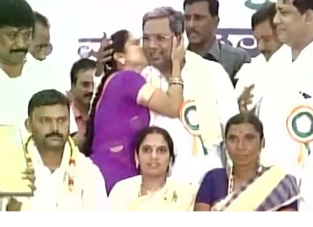 Woman gives ‘peck on cheek’ to Karnataka CM in public