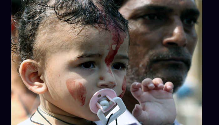 Photos: Even kids dont stay back to shed blood for Imam Hussein