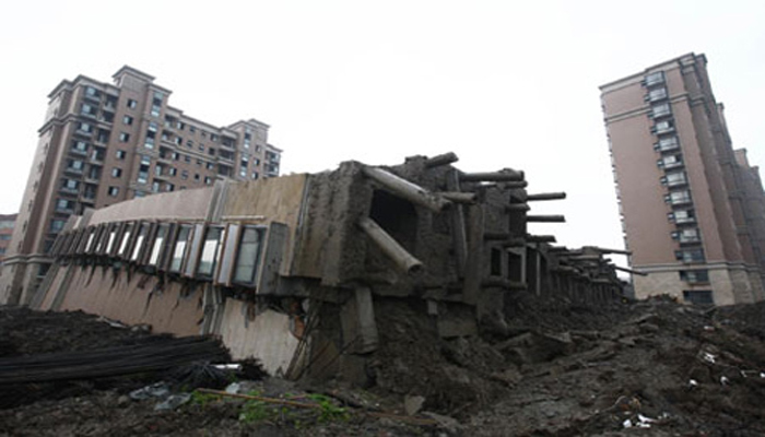 74 killed as under construction building in China collapsed