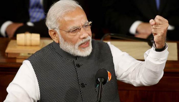 Manmohan Singh knows how to bathe wearing a raincoat, says PM in RS