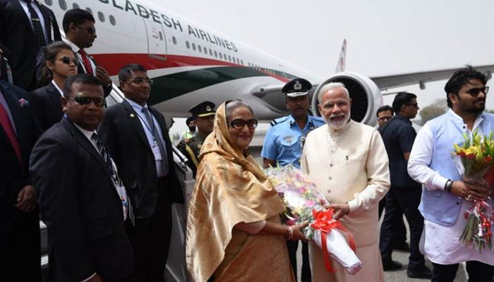PM Narendra Modi ignores protocol to welcome Sheikh Hasina