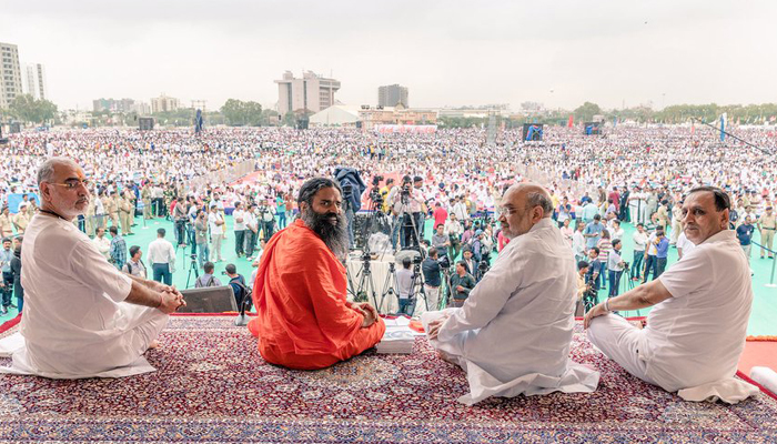 Baba Ramdev, Amit Shah, CM Rupani perform Yoga in Ahmedabad