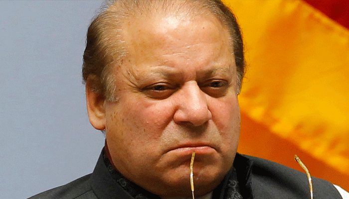 Nawaz Sharif puts down papers as the PM of Pakistan