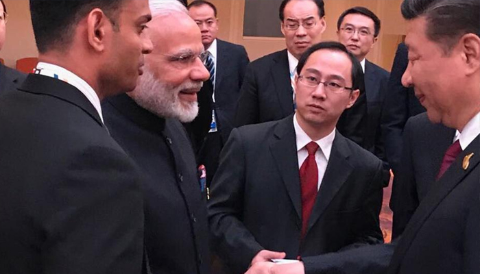 PM Modi, Xi smile, shake hands, discuss issues at BRICS meeting
