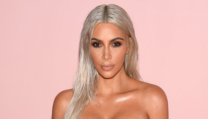 This is why Kim Kardashian went topless on her recent trip!