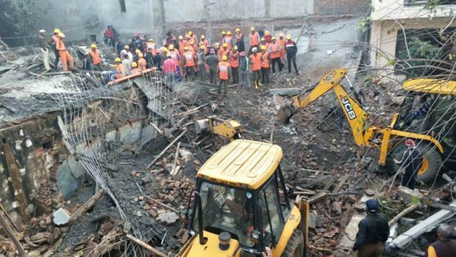 One killed as slab of under-construction building collapses