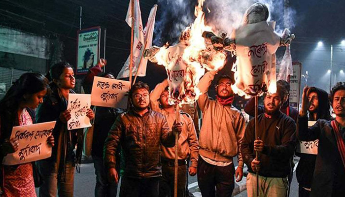 Protesters wreck BJP office in Assam, burn Modis effigy