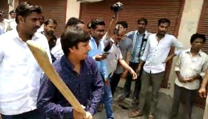 BJP leader Vijayvargiyas son beats officer with cricket bat, Video goes viral