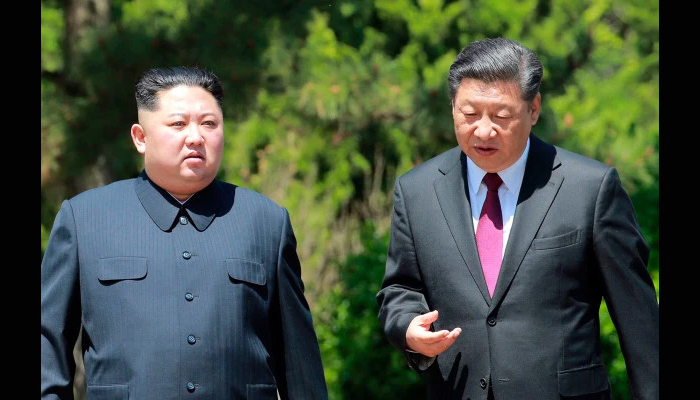 Xi arrives in North Korea to meet Kim ahead of Donald Trump talks
