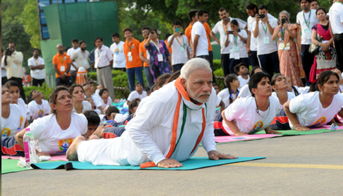 Check out this cartoon character performing yoga with PM Modi