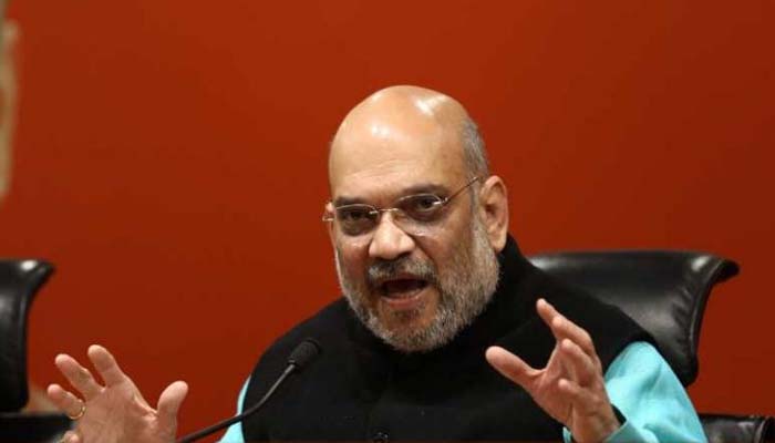 Shah dares Rahul to declare Cong will restore Art 370 in J&K