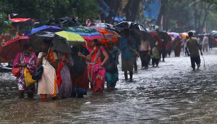 High alert in Mumbai: Heavy rain halts the normal life, floods city streets