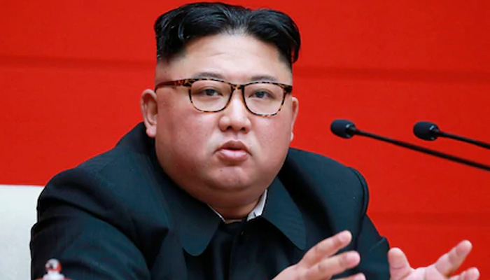 Trenchcoats and rockets: Kim supervises N Korea weapons test
