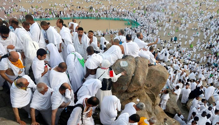 Muslim hajj pilgrims ascend Mount Arafat for day of worship