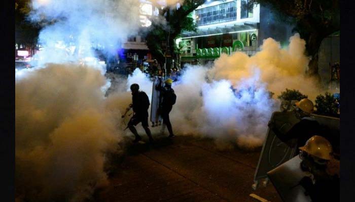 Twin rallies after tear gas clashes in Hong Kong tourist district