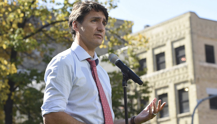 Trudeau apologises again for wearing blackface as new images emerge
