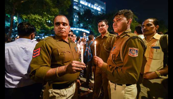 Families stand by Police personnel who staged stir at Police HQ