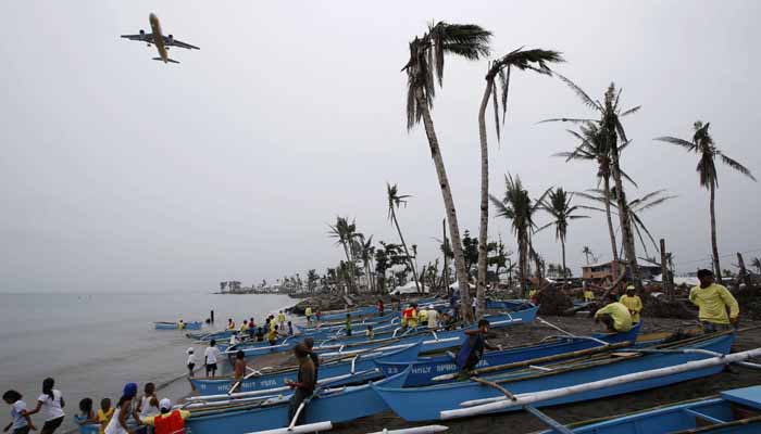 Peace wishes ring in Christmas, but typhoon dampens joy in Philippines