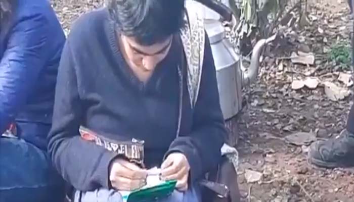 Video of a female protester rolling Joint in JNU protest goes viral | Watch