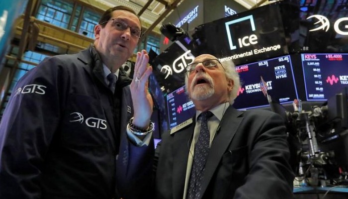 World stocks mixed after Wall Street sinks despite rate cut