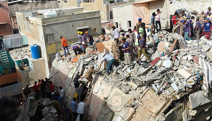 Death toll in Pakistan building collapse rises to 18