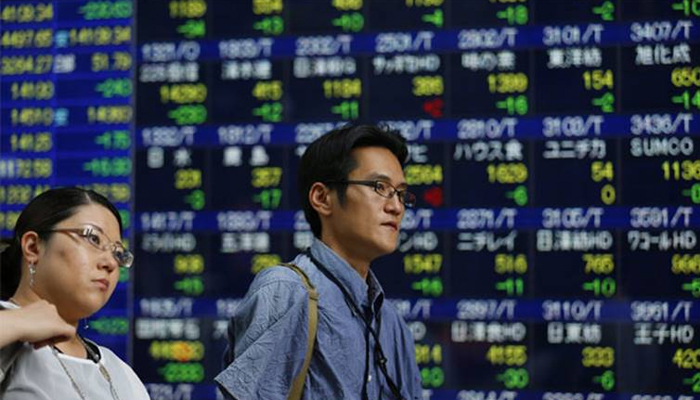 Asian shares mixed after lackluster session on Wall Street