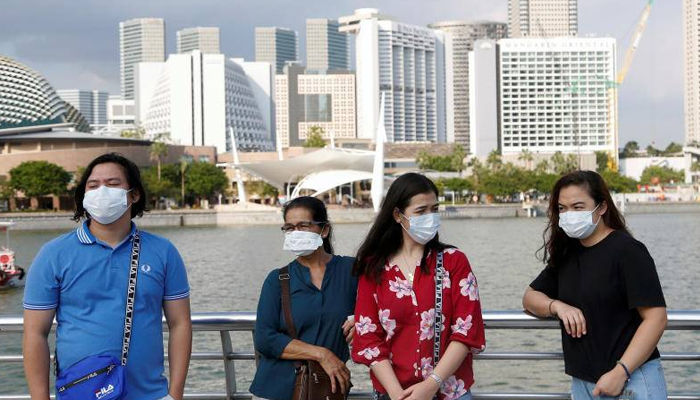 Singapore warns of further waves of COVID-19 until vaccine found