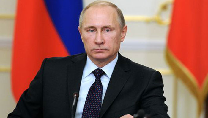Russian President Putin signs foreign agent media law