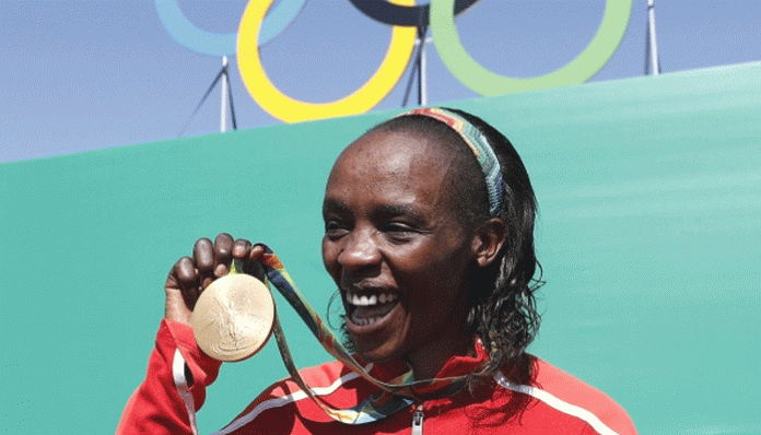 Kenya Olympic champ Sumgong banned for 4 years for doping
