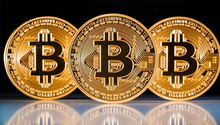 Bitcoin surges above $14,000 to new high