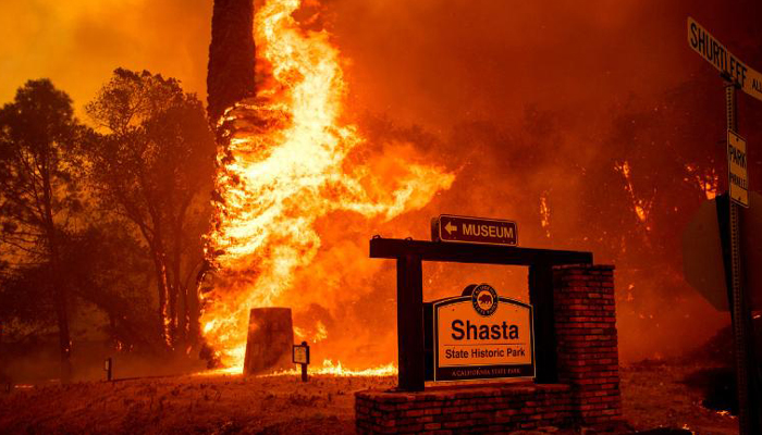 Deadly wildfire devastates California; 2 killed, thousands flee