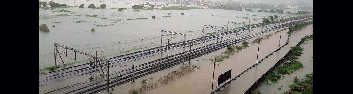 Two dead, flight overshoots runway as rains still batter Mumbai