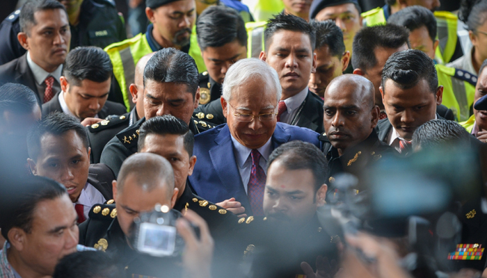 Former Malaysian PM charged with abuse of power