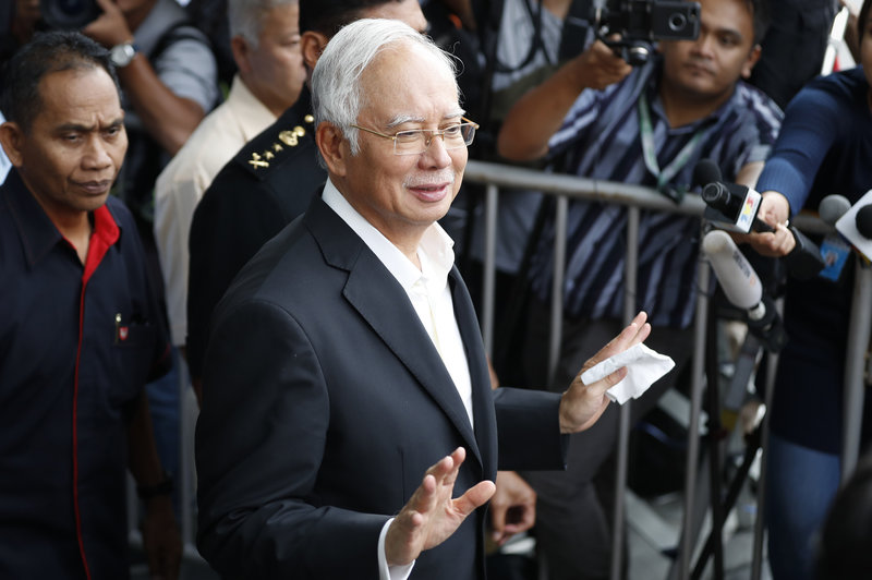 Former Malaysian PM arrested, to face fresh charges