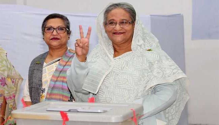 Bangladesh election: PM Sheikh Hasina wins landslide in disputed vote